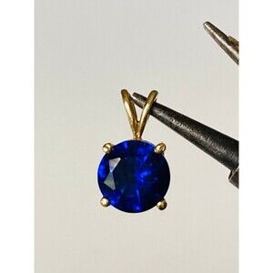 Tested 14k gold genuine blue topaz Pendant